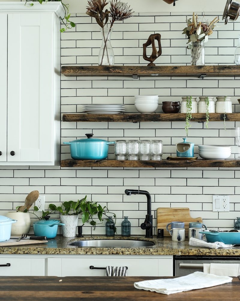 Vancouver kitchen with granite countertops, open shelving, and natural light